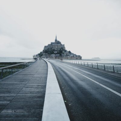 Gray Concrete Road Under White Sky