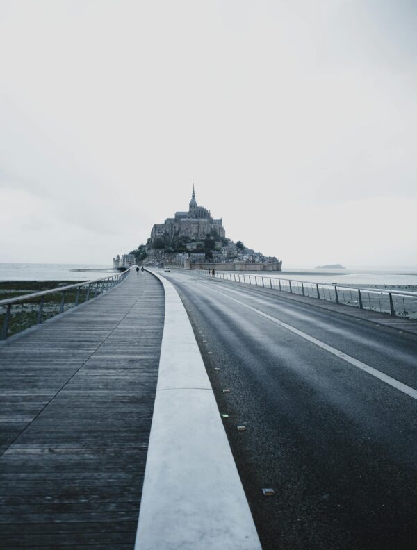 Gray Concrete Road Under White Sky